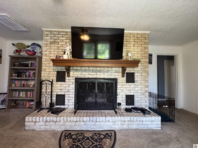 living room with carpet, a textured ceiling, visible vents, and a brick fireplace