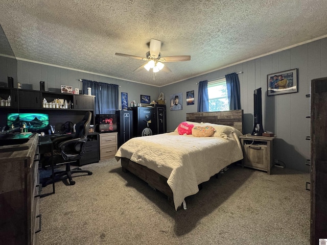 carpeted bedroom with a textured ceiling and a ceiling fan