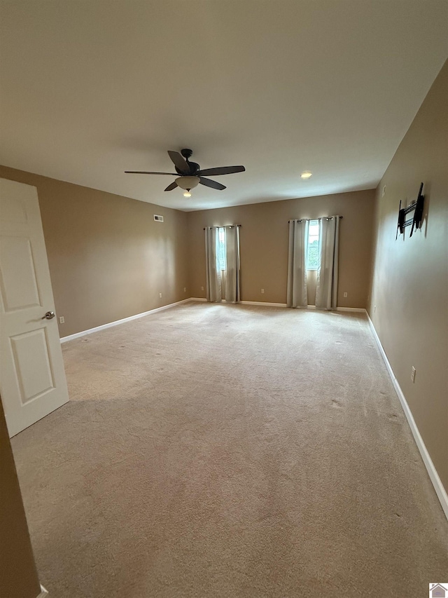 1040 Lone Valley Rd, Calvert City, KY 42029 - empty room with ceiling fan, baseboards, and light carpet