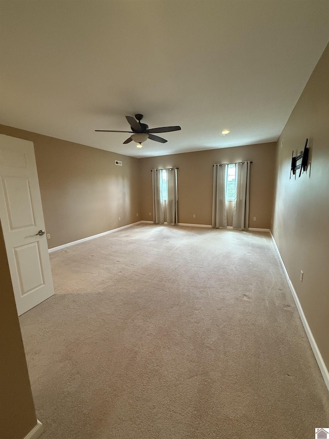1040 Lone Valley Rd, Calvert City, KY 42029 - unfurnished room featuring light colored carpet, a ceiling fan, and baseboards