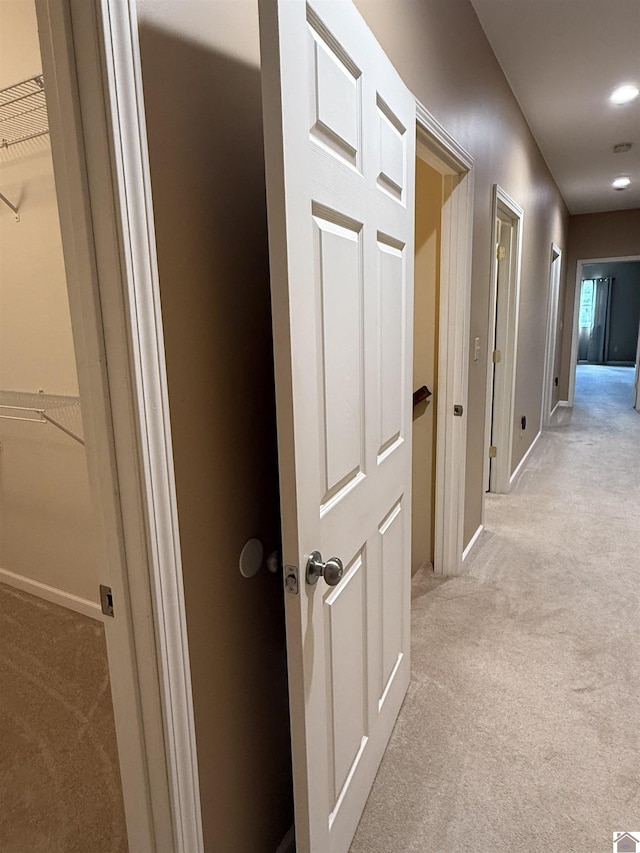 1040 Lone Valley Rd, Calvert City, KY 42029 - hallway featuring light colored carpet and baseboards