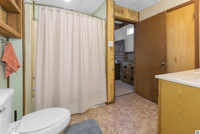 bathroom featuring toilet, tile patterned floors, a shower with curtain, and vanity