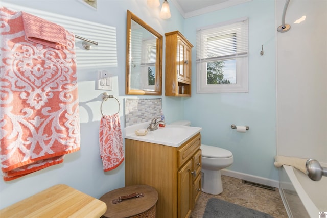 full bathroom featuring backsplash, toilet, vanity, baseboards, and ornamental molding