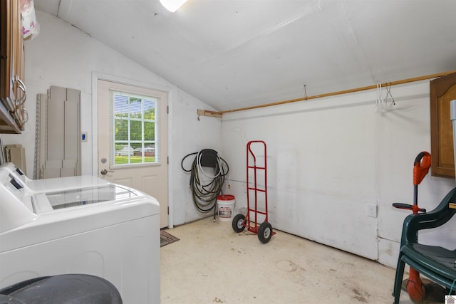 clothes washing area featuring cabinet space and washer and dryer