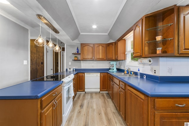 kitchen featuring white appliances, open shelves, brown cabinets, a sink, and ornamental molding