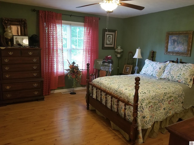 6576 Blue Springs Rd, Cadiz, KY 42211 - bedroom with light wood-style floors, ceiling fan, and baseboards