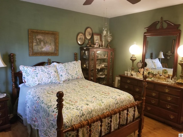 6576 Blue Springs Rd, Cadiz, KY 42211 - bedroom with wood finished floors and a ceiling fan