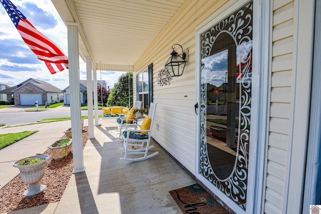 view of patio with a porch and a residential view
