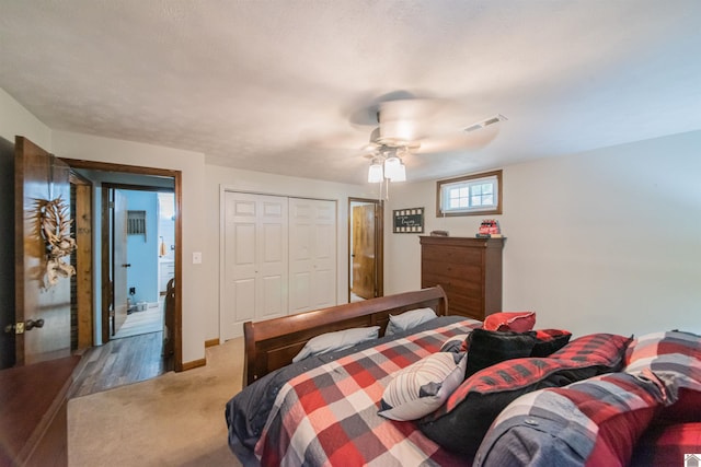 2782 Foust Sledd Rd, Benton, KY 42025 - bedroom with a ceiling fan, a closet, light carpet, and baseboards
