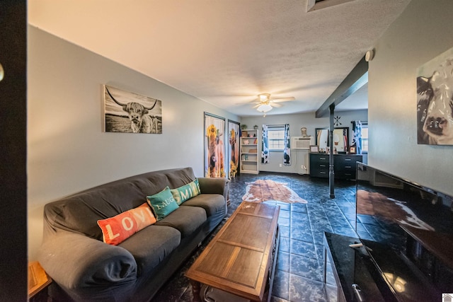 2782 Foust Sledd Rd, Benton, KY 42025 - living area featuring a textured ceiling, a ceiling fan, and dark tile patterned flooring