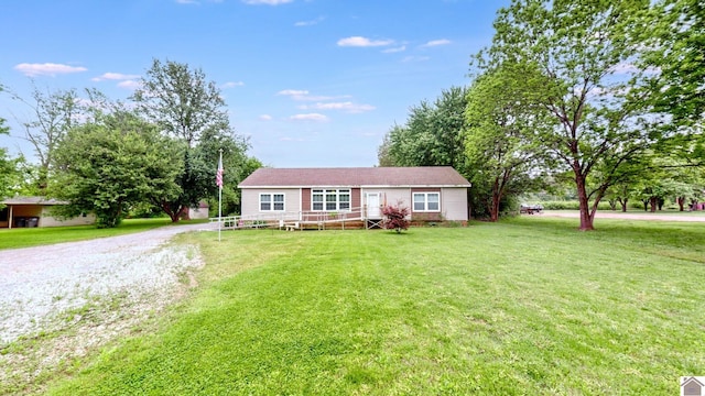 single story home featuring a front yard