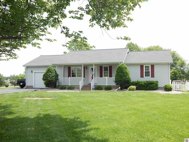 222 Ash St, Benton, KY 42025 - ranch-style home with covered porch, an attached garage, driveway, and roof with shingles