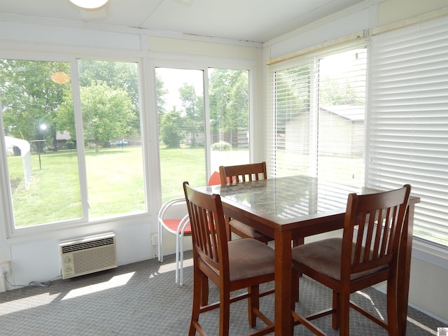 222 Ash St, Benton, KY 42025 - sunroom / solarium featuring healthy amount of natural light, carpet, and a wall unit AC