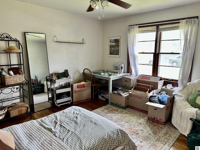 203 N 17th, Murray, KY 42071 - bedroom featuring wood finished floors, a textured wall, and ceiling fan