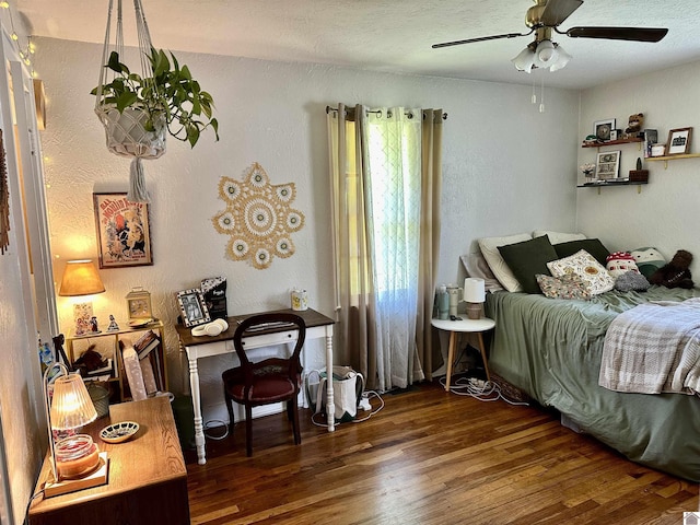 203 N 17th, Murray, KY 42071 - bedroom with wood finished floors, a textured wall, and ceiling fan