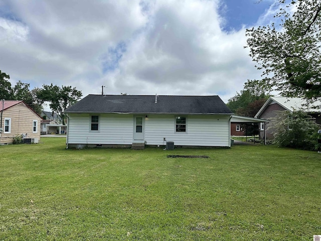 203 N 17th, Murray, KY 42071 - rear view of property with entry steps, a yard, and central AC unit