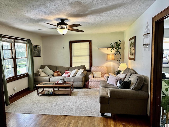 203 N 17th, Murray, KY 42071 - living area with wood finished floors, a ceiling fan, and a textured ceiling