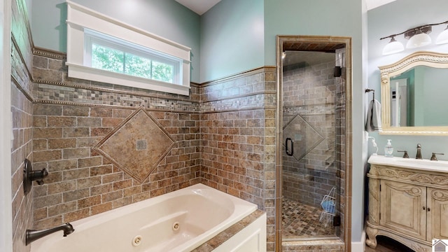 171 Cagel, Gilbertsville, KY 42044 - bathroom featuring a stall shower, a jetted tub, and vanity