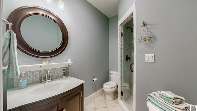 171 Cagel, Gilbertsville, KY 42044 - full bath with toilet, a stall shower, tasteful backsplash, tile patterned flooring, and vanity