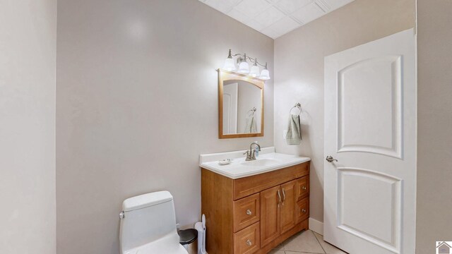 171 Cagel, Gilbertsville, KY 42044 - bathroom featuring toilet, vanity, and tile patterned flooring