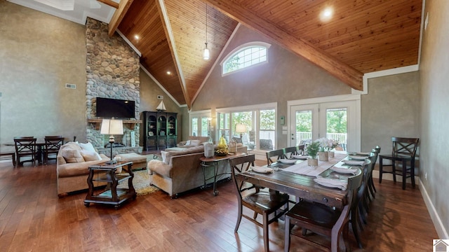171 Cagel, Gilbertsville, KY 42044 - dining area with hardwood / wood-style flooring, wood ceiling, high vaulted ceiling, beam ceiling, and baseboards