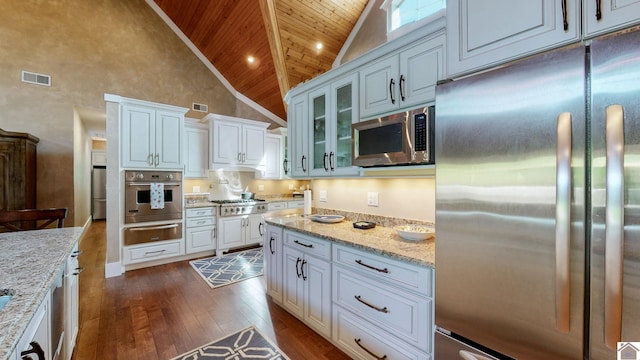 171 Cagel, Gilbertsville, KY 42044 - kitchen featuring appliances with stainless steel finishes, wooden ceiling, a warming drawer, high vaulted ceiling, and dark wood-style flooring