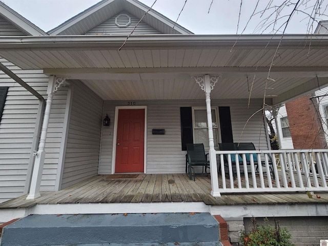 doorway to property with a porch