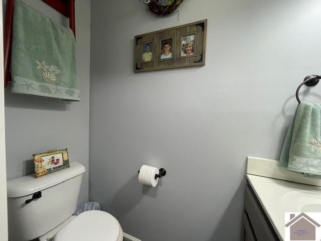 695 Heritage Trce, Cadiz, KY 42211 - half bath featuring toilet, vanity, and baseboards