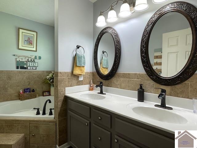 695 Heritage Trce, Cadiz, KY 42211 - full bathroom featuring a bath and double vanity