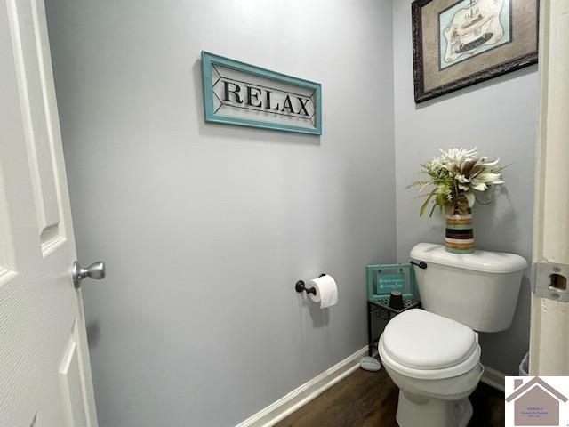 695 Heritage Trce, Cadiz, KY 42211 - bathroom featuring baseboards, wood finished floors, and toilet