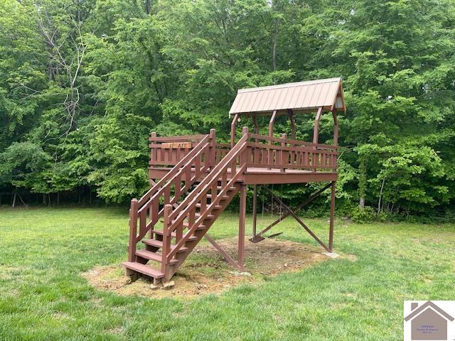 695 Heritage Trce, Cadiz, KY 42211 - view of playground featuring a lawn and a wooded view