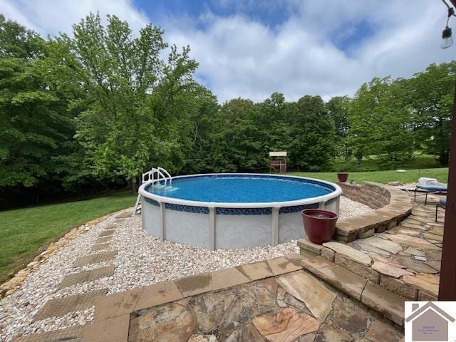695 Heritage Trce, Cadiz, KY 42211 - outdoor pool featuring a yard