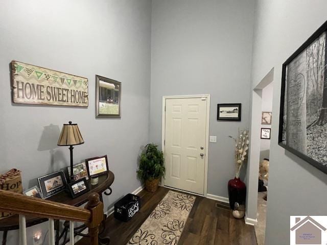 695 Heritage Trce, Cadiz, KY 42211 - foyer with a high ceiling, wood finished floors, and baseboards