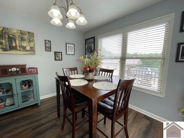 695 Heritage Trce, Cadiz, KY 42211 - dining area with a chandelier, baseboards, and dark wood-style flooring