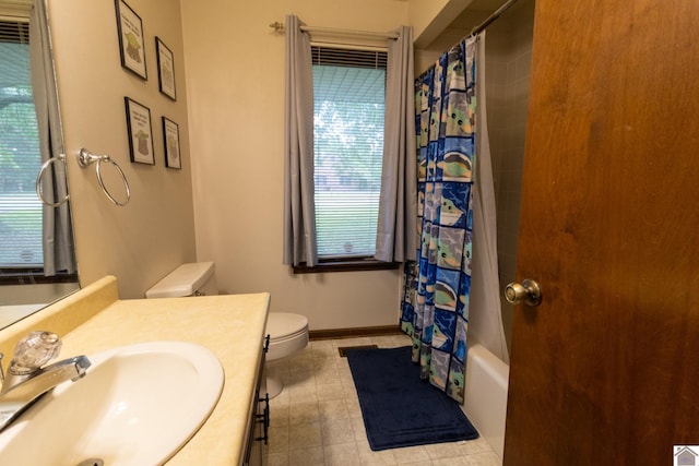 full bathroom featuring toilet, vanity, baseboards, and shower / bathtub combination with curtain