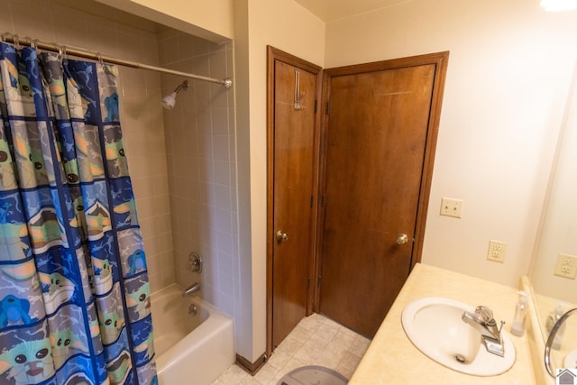 full bath featuring shower / tub combo and vanity