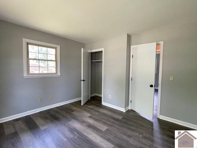 197 Briarfield Ln, Cadiz, KY 42211 - unfurnished bedroom with dark wood finished floors, baseboards, and a closet