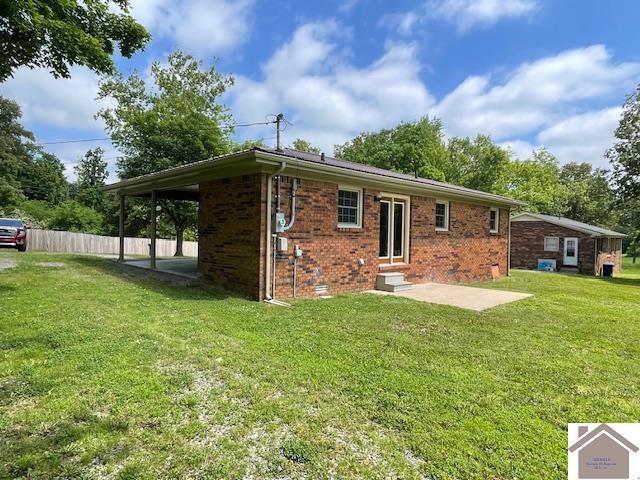 197 Briarfield Ln, Cadiz, KY 42211 - rear view of property with brick siding, a patio, and entry steps