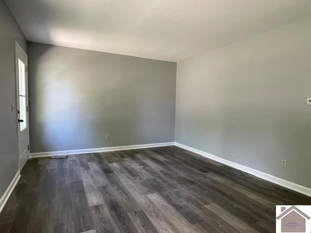 197 Briarfield Ln, Cadiz, KY 42211 - unfurnished room featuring dark wood finished floors and baseboards