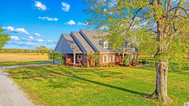 730 Rob Mason Rd, Murray, KY 42071 - view of front facade with driveway, a front lawn, brick siding, and an attached garage