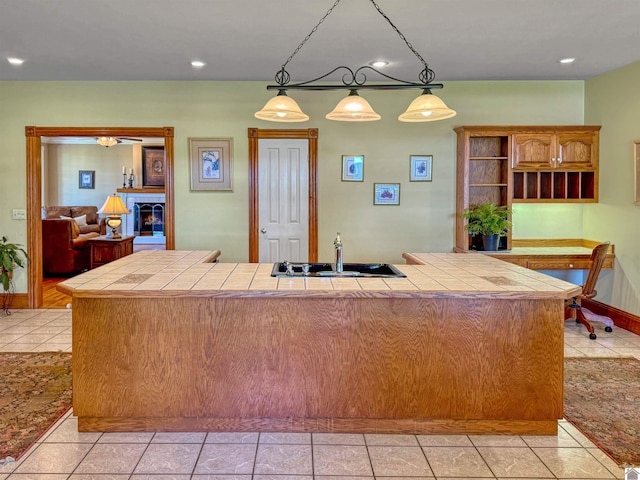 730 Rob Mason Rd, Murray, KY 42071 - kitchen with tile countertops, open shelves, a sink, light tile patterned floors, and recessed lighting