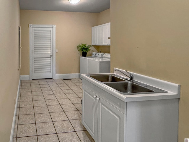 730 Rob Mason Rd, Murray, KY 42071 - washroom featuring independent washer and dryer, cabinet space, light tile patterned floors, and baseboards