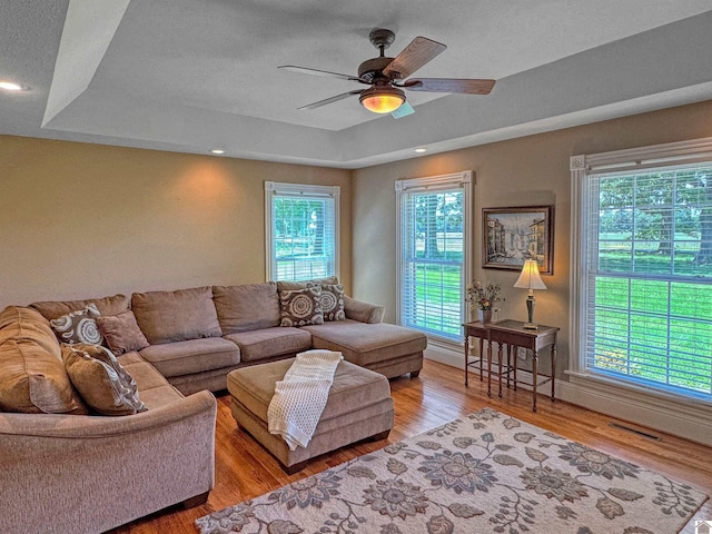 730 Rob Mason Rd, Murray, KY 42071 - living area featuring a tray ceiling, wood finished floors, ceiling fan, and recessed lighting