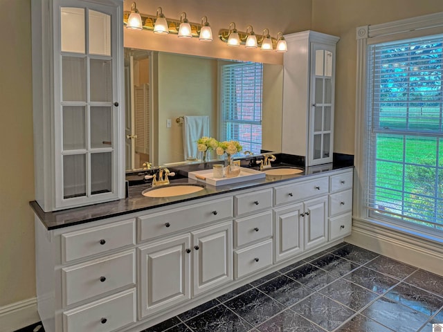 730 Rob Mason Rd, Murray, KY 42071 - full bathroom with double vanity and baseboards