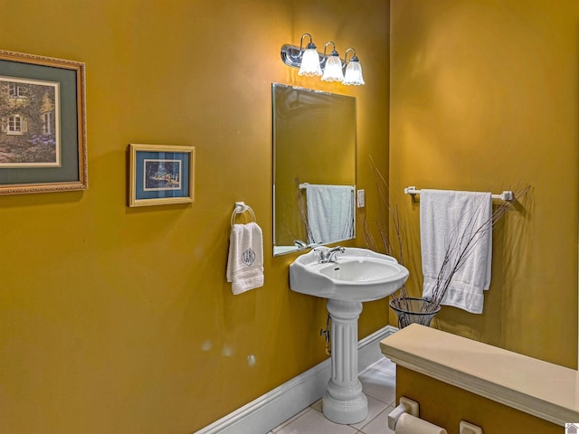 730 Rob Mason Rd, Murray, KY 42071 - bathroom featuring tile patterned floors, baseboards, and a sink