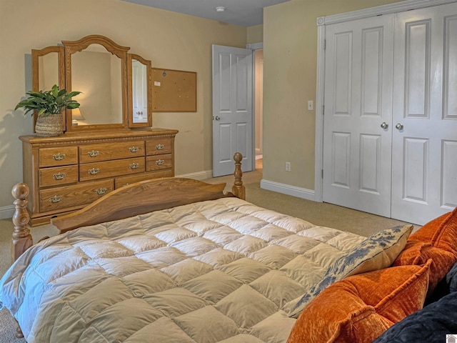 730 Rob Mason Rd, Murray, KY 42071 - bedroom with light carpet, baseboards, and a closet