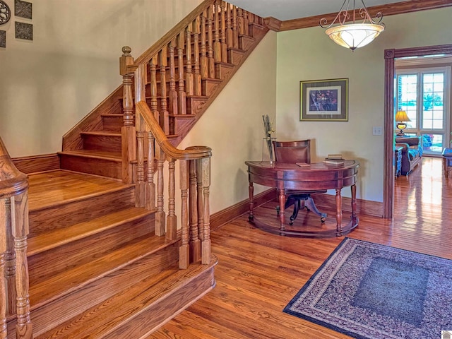 730 Rob Mason Rd, Murray, KY 42071 - staircase with baseboards, wood finished floors, and crown molding