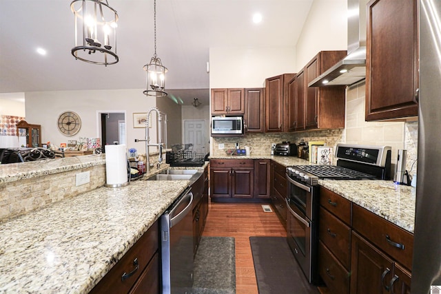 1300 Rocky Rd, Fancy Farm, KY 42039 - kitchen with stainless steel appliances, a sink, wall chimney range hood, dark wood-type flooring, and decorative backsplash