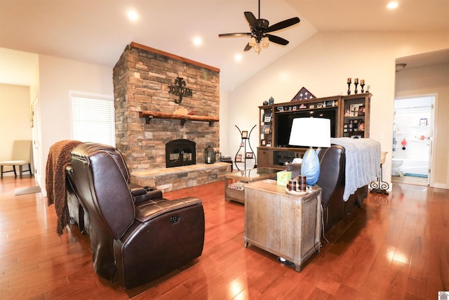 1300 Rocky Rd, Fancy Farm, KY 42039 - living area with a ceiling fan, vaulted ceiling, wood finished floors, a stone fireplace, and recessed lighting