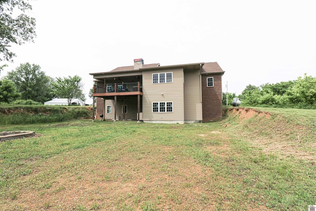 1300 Rocky Rd, Fancy Farm, KY 42039 - back of property with a chimney and a lawn